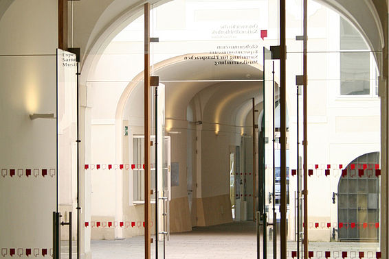Glass door: Entrance to the Department of Music