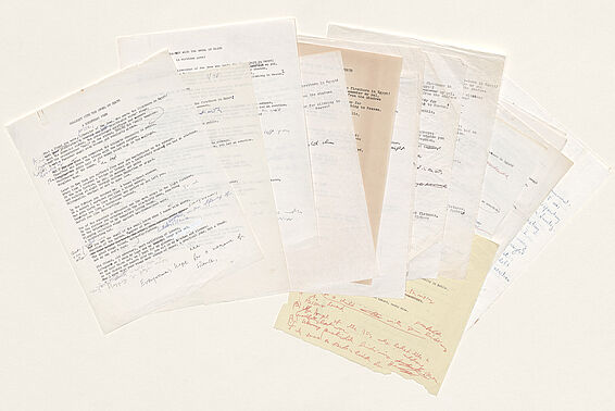 Various sheets of paper with the same poem typed on it
