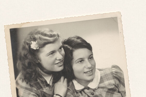 Two black and white photos of two little girls