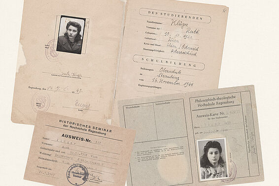 Three different, old IDs, two of them with protrait