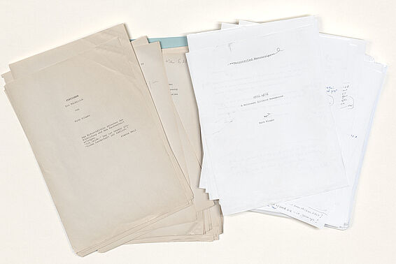 Various pieces of paper with text printed on them