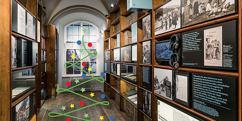 Bild einer Weihnachtsbaumgrafik in einem Museumsraum