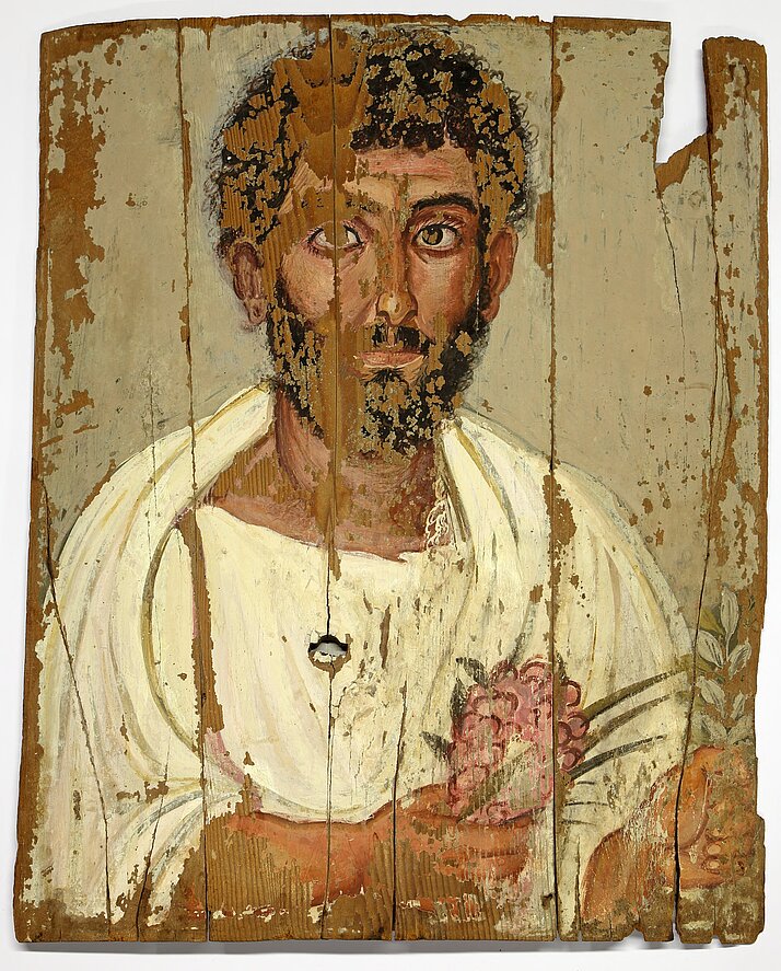Portrait of a bearded man, painted on wood