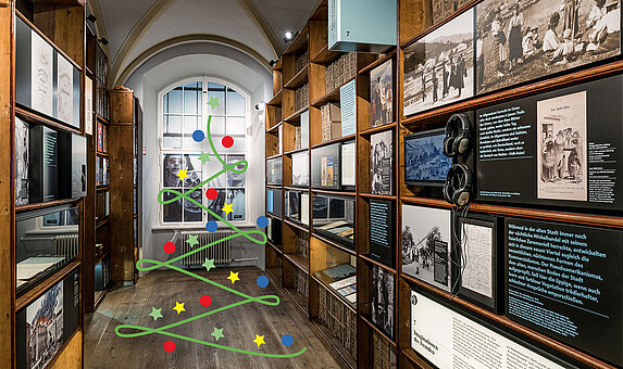 Bild einer Weihnachtsbaumgrafik in einem Museumsraum
