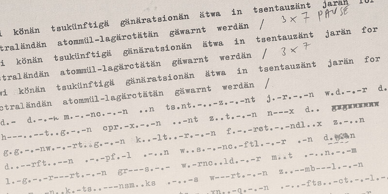 Handschriftlicher Text auf weißem Papier.