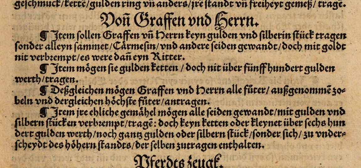 Mittelalterlicher Text in einem Buch in Frakturschrift.