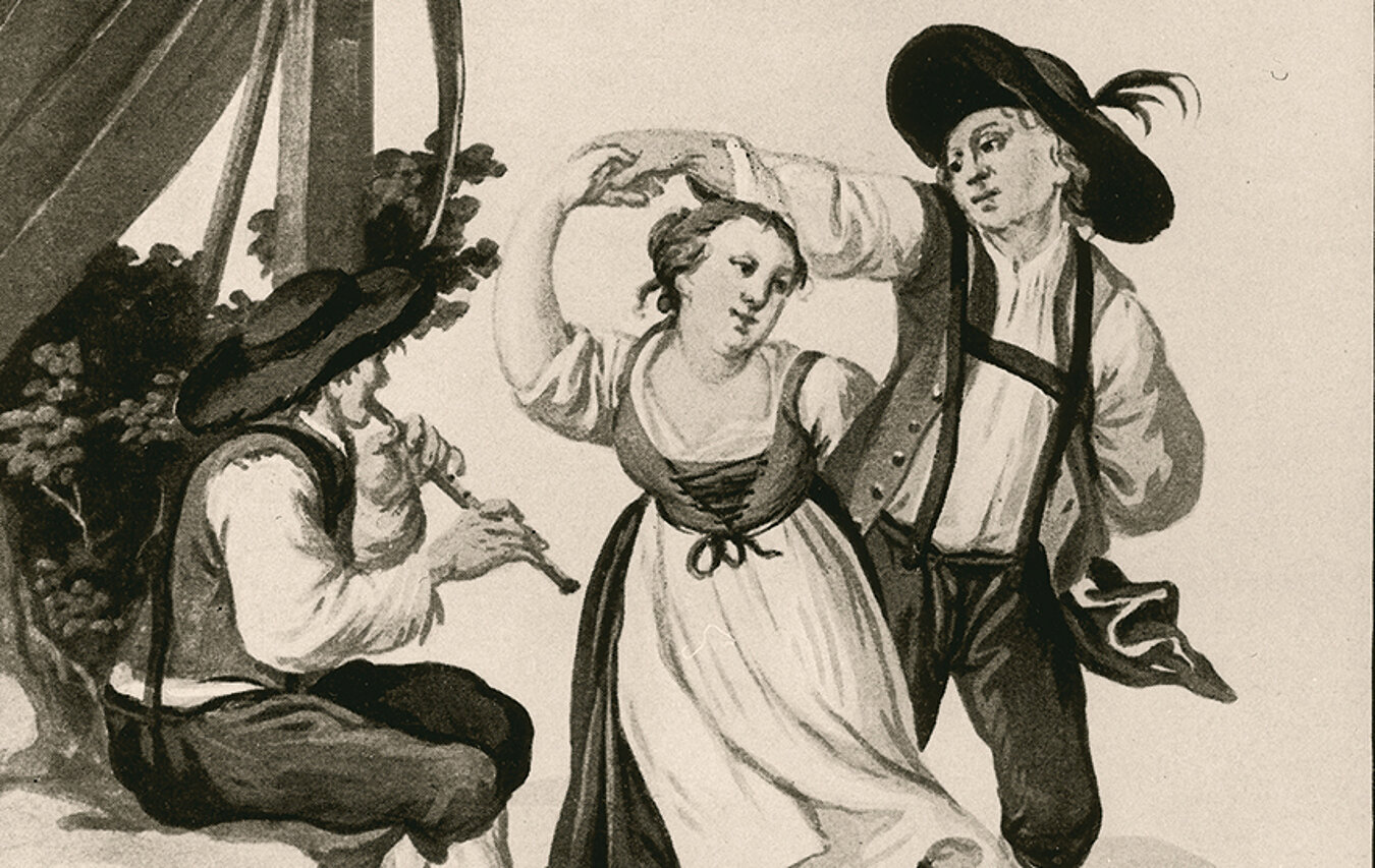 Flötenspieler musiziert für ein Tanzpaar 