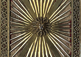 Front cover richly decorated with metal 